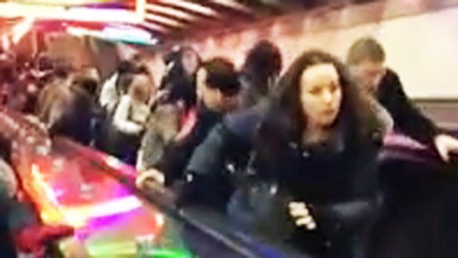 A PATH train rider captured this video of an escalator full of rush hour commuters suddenly changing directions at the Exchange Place PATH station in Jersey City, N.J., on Monday. Six people were injured, officials said.