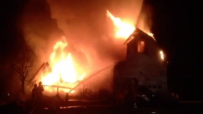 A New York police captain, his wife and two daughters died when their Carmel home went up in flames. Only the captain's son survived. Gus Rosendale reports.