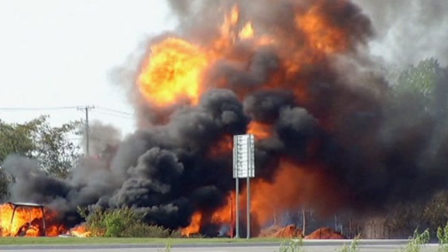 Utility officials say four people hurt in a natural gas pipeline explosion north of Dallas all have minor injuries. A crew was working in McKinney when a piece of equipment ruptured the line, sending up flames and thick black smoke.