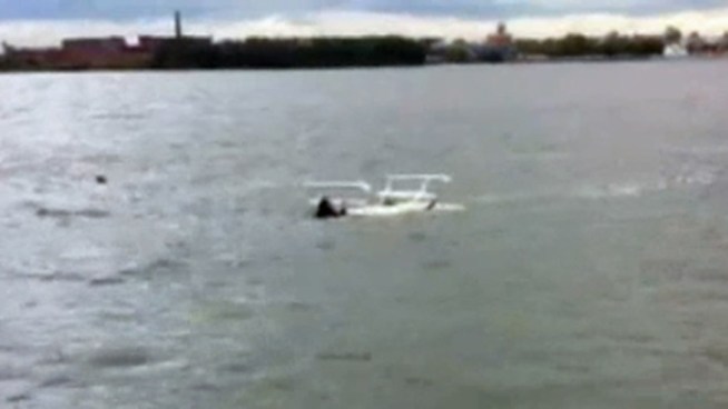 Amateur video taken just after a helicopter crashed in the East River. Courtesy Steven Castro.