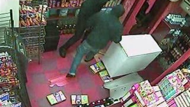 A pair of armed robbers at a Brooklyn deli were interrupted by police officers. The robbers try to make an escape but eventually surrender. Watch the surveillance video here.