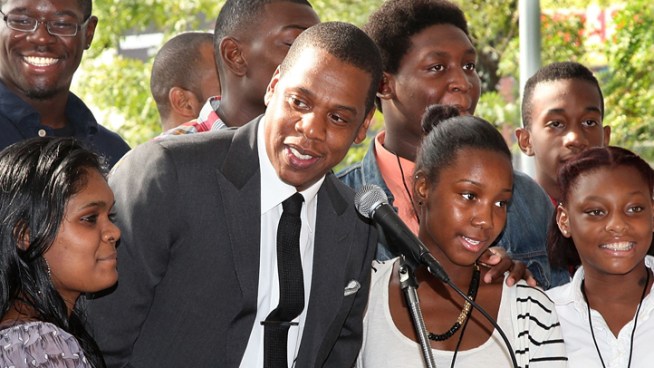 Hip-hop mogul Jay-Z gives Brooklyn a shoutout as he helps launch the Nets' aggressive marketing campaign, featuring him, to lure fans to Barclays Center.