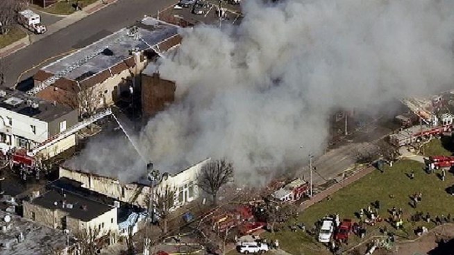 A five-alarm fire destroyed an apartment building in Long Branch, N.J. Monday afternoon. This is raw video of the fire.