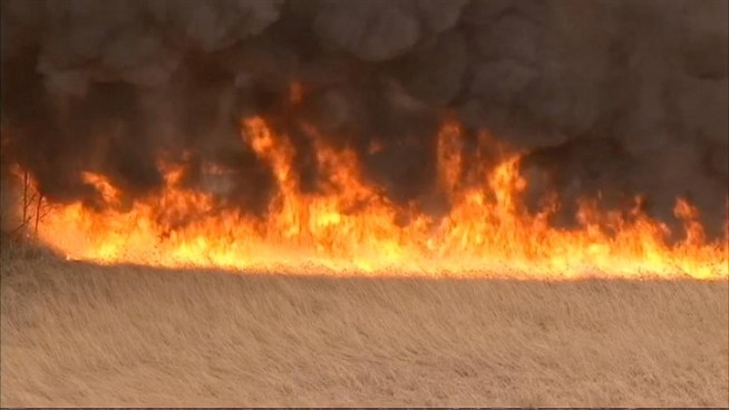 Firefighters battled a fast-moving brush fire near the Meadowlands Wednesday afternoon. Check out this raw video.
