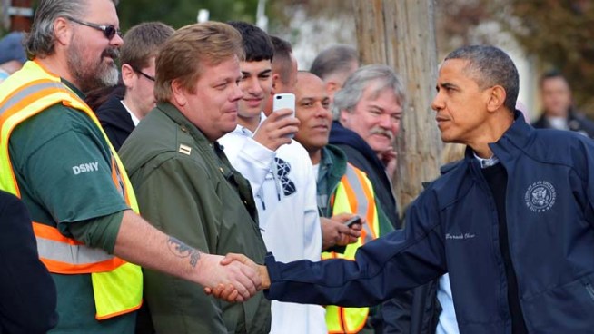 President Barack Obama toured the devastation that Sandy waged on New York City, flying over flood-ravaged Queens before landing in Staten Island to meet storm victims who lost homes and loved ones. Tracie Strahan reports.