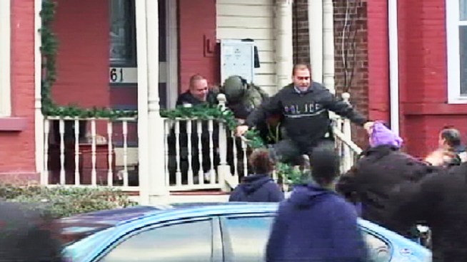 A Newburgh, N.Y. man who barricaded himself in a house after officers went to arrest him on an attempted murder charge surrendered after 10 hours Wednesday in a chaotic police takedown. Gus Rosendale reports.