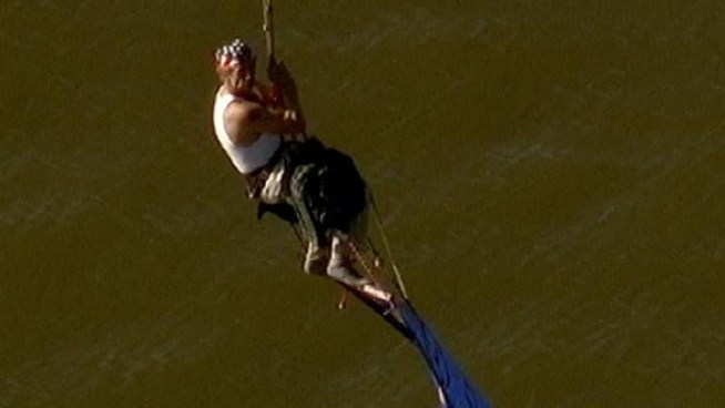 A daring demonstration on the Tappan Zee Bridge ended with a splash, when 54-year-old Michael Davitt sat for three hours to protest his being let go from a Rockland County job. John Noel reports.