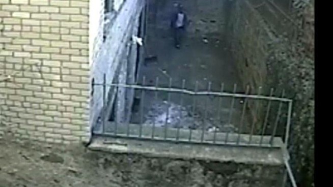 Police released surveillance video of a rape suspect forcing a woman into a Brooklyn alley before attacking her.