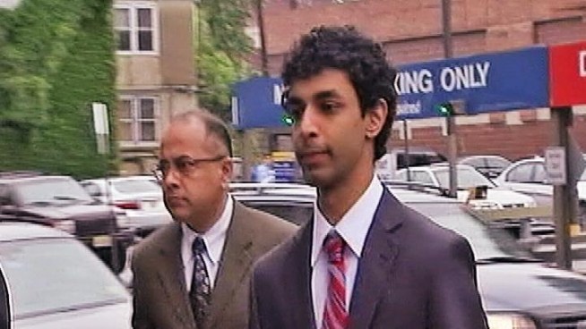 Dharun Ravi, charged with bias intimidation and other crimes in connection with the death of his former Rutgers roommate Tyler Clementi, walks into court accompanied by his lawyer.