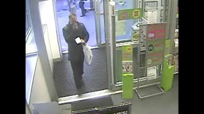 Police released this surveillance video of a suspect wanted in at least eight robbery attempts entering a Duane Reade on 7th Avenue.