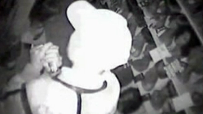 Police released surveillance video of the suspected robber captured during one of the break-ins.