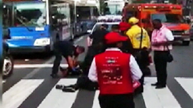 A disgruntled accessories designer made good on a deadly threat he made in the past, police say, when he calmly shot a former co-worker dead in front of horrified onlookers. A civilian alerted officers, who ultimately shot and killed the gunman. When it was over, two were dead and nine others were hurt. Marc Santia has more.