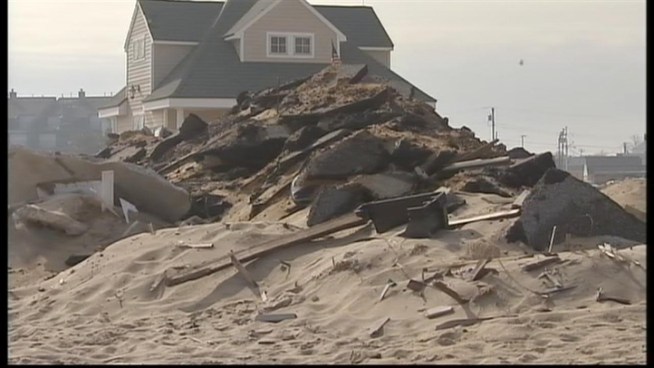 Residents of one New Jersey community are under a hard deadline to get debris-filled sand off their property by Wednesday night, or pay for its cleanup themselves. News 4's Brian Thompson reports.