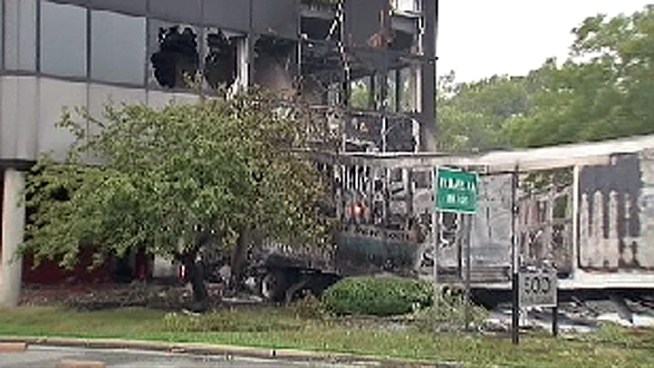 A tractor trailer careened off a highway in New Jersey Saturday morning, crashing into a building and causing causing major traffic delays.
