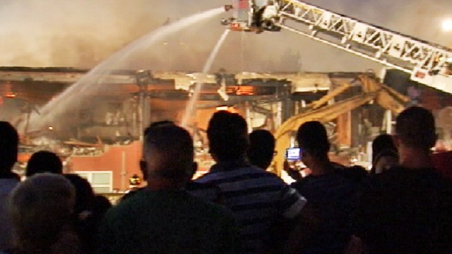 Firefighters have had to gut two buildings at a Woodbridge, N.J. apartment complex after a massive fire tore through them Tuesday afternoon, leaving them uninhabitable. Katy Tur reports.