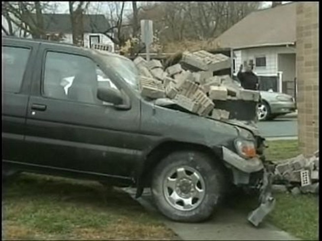 Police removed an SUV that crashed into a Post Office in <a title=
