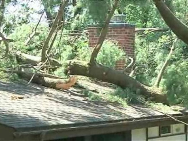 Powerful twister leaves a path of destruction in its wake.
