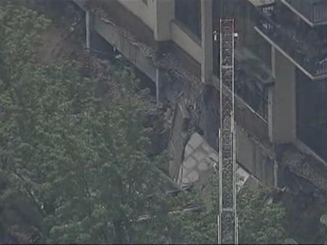 Search-and-rescue teams raced to an apartment building in <a title=