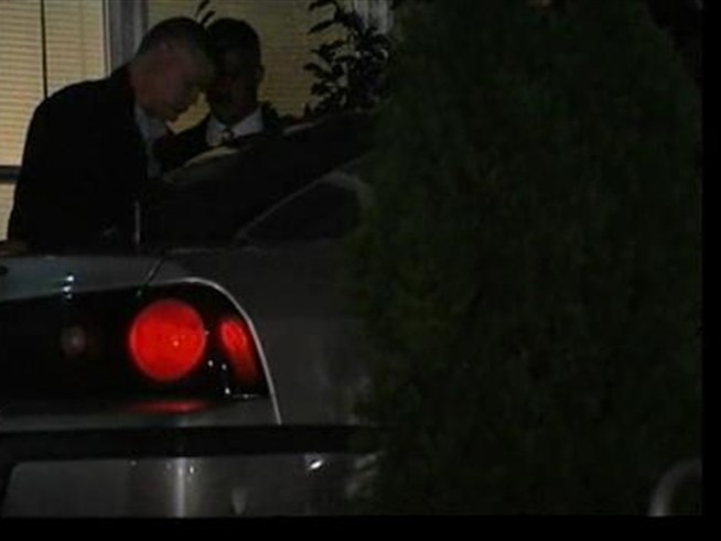 Ray Clark is taken in by police.