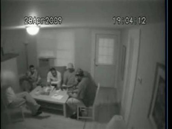 A videotape shows the alleged mastermind of a plot to attack <a title=