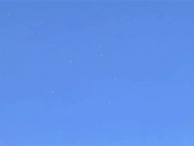 The lighted, flying object had dozens of people staring at the Chelsea sky.