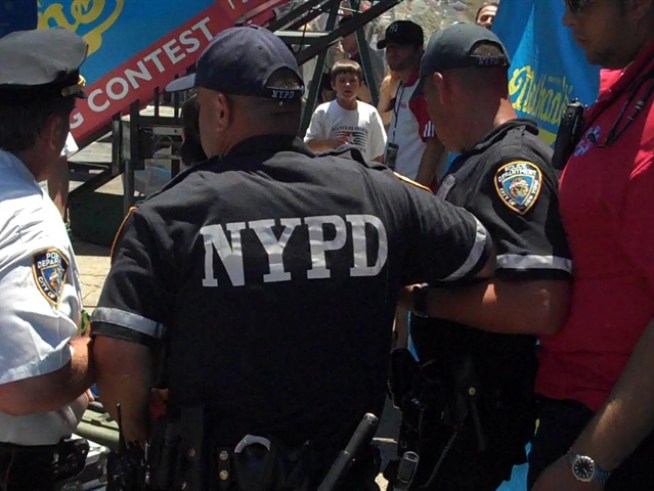 The former six-time hot dog eating champ turned chump at the  annual July 4th event, when he was arrested for trying to rush the stage. 