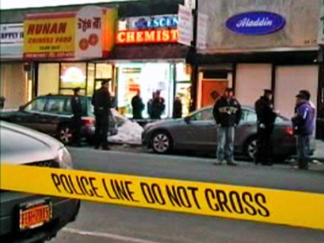 An estranged husband shot his ex-wife in the head in the store where she worked Thursday afternoon.