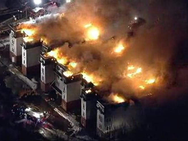 Chopper 4 captures a massive blaze tearing through a condo complex in <a title=