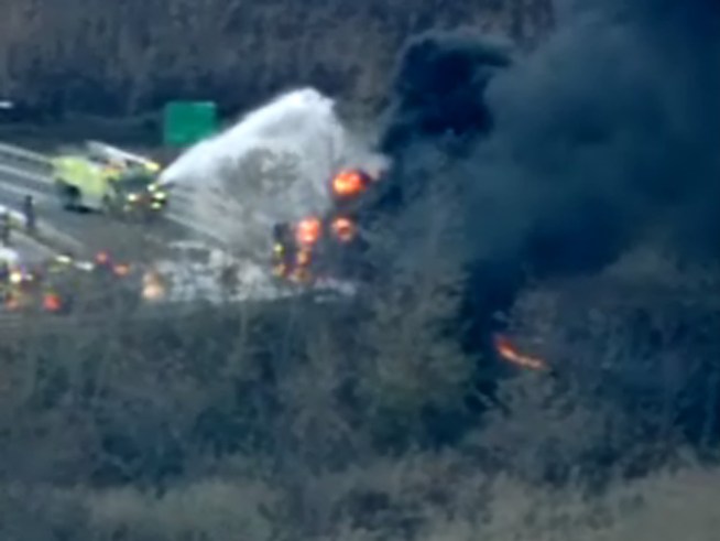 Driver in Serious Condition following Fiery Crash, Traffic Delayed
