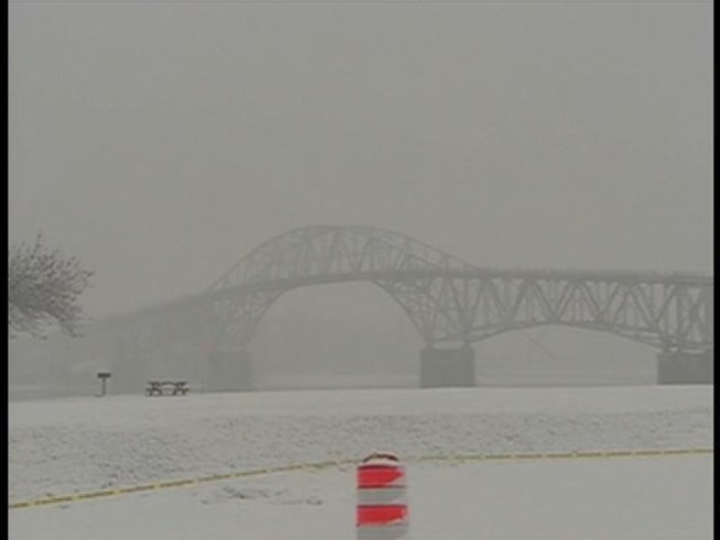 The Lake Champlain Bridge linking New York and Vermont crashed into the lake Monday, as controlled explosions brought down the unsafe 80-year-old span that was the first of its kind used for highway traffic and a design that was duplicated on numerous other bridges.