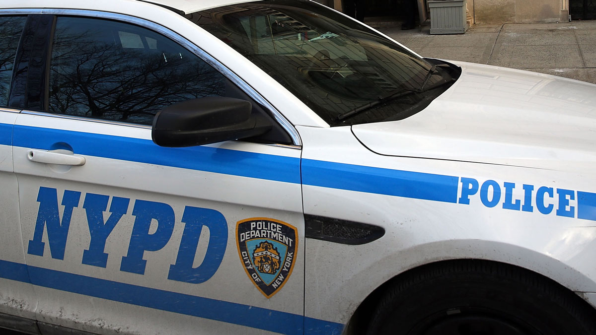 Startling Video Shows Man Hopping Onto Moving NYPD Cruisers