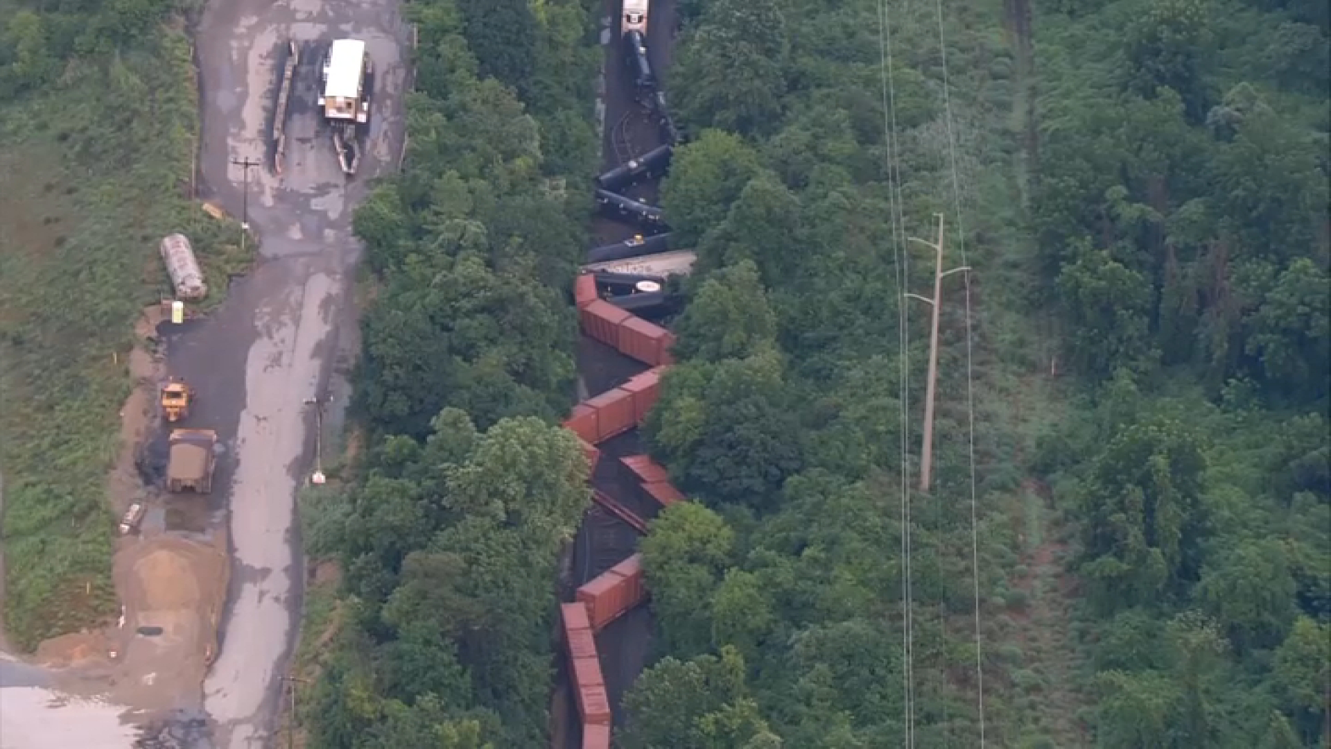 snaked freight train cars after derailment