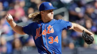 New York Mets starting pitcher Noah Syndergaard winds up during the first inning of a baseball game against the Atlanta Braves, Sunday, Sept. 29, 2019, in New York. (AP Photo/Kathy Willens)