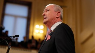 A side profile of New Jersey Governor Phil Murphy as he speaks at the State of the State address in Trenton, New Jersey.