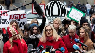 FILE – In this Jan. 6, 2020, file photo, Louise Godbold, center, speaks at a news conference outside a Manhattan courthouse after Harvey Weinstein arrived in New York. Godbold, who said that Weinstein sexually assaulted her after she sought an internship in 1991, isn’t sure that justice is yet available in the court system. “But, in a global sense, justice to me is that his power and influence is taken away,” Godbold said. (AP Photo/Mark Lennihan, File)