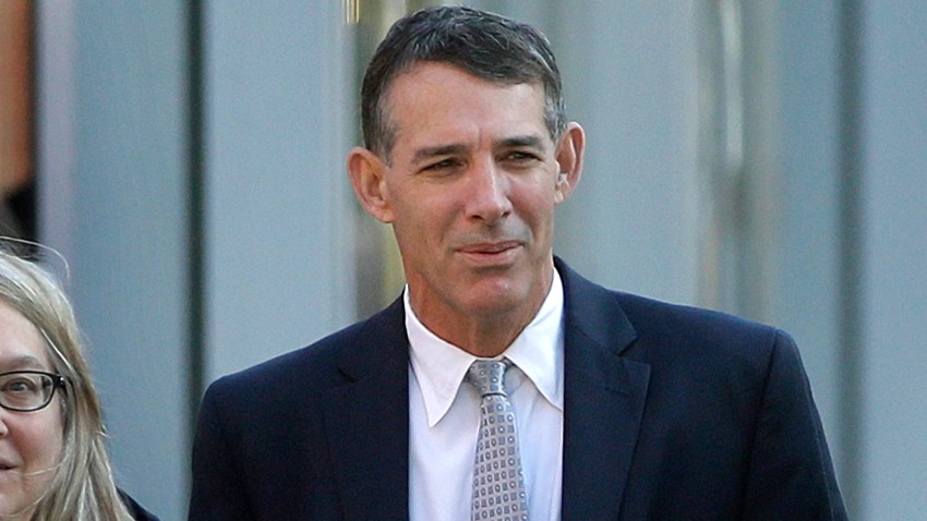 Michael Center, former men's tennis coach at the University of Texas at Austin arrives, Monday, Feb. 24, 2020, at federal court in Boston for sentencing, in a nationwide college admissions bribery scandal.
