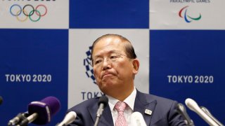 In this March 30, 2020, file photo, Tokyo 2020 Organizing Committee CEO Toshiro Muto attends a news conference after a Tokyo 2020 Executive Board Meeting in Tokyo.