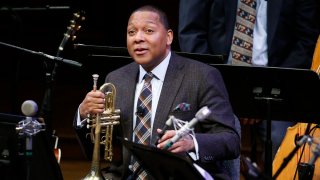 FILE - In this Jan. 30, 2014 file photo, Musician Wynton Marsalis speaks during a lecture performance at Harvard University's Sanders Theatre in Cambridge, Mass