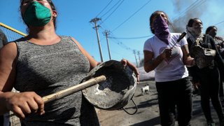 Protesters in Chile gather to demand food aid amid the coronavirus pandemic