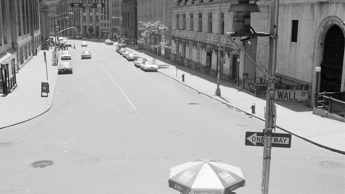 New York's Wall Street is deserted Thursday, July 14, 1977, after a massive power failure that lasted overnight from Wednesday forced the closing of the New York Stock Exchange. (AP Photo)