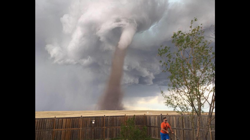 Alberta-Man-Mowing-Lawn-Tornado