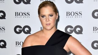 In this Sept. 6, 2016, file photo, Amy Schumer arrives for GQ Men Of The Year Awards 2016 at Tate Modern in London, England.
