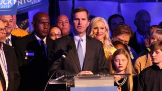 In this Nov. 5, 2019, file photo, apparent Gov.-elect Andy Beshear celebrates with supporters after voting results showed the Democrat holding a slim lead over Republican Gov. Matt Bevin at C2 Event Venue in Louisville, Kentucky.