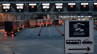 In this Feb. 1, 2020, file photo, lorries wait to board ferries on the morning after Brexit took place at the Port of Dover in Dover, England.