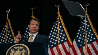 New York Governor Andrew Cuomo delivers a speech on the importance of renewable energy and signs the Climate Leadership and Community Protection Act at Fordham Law School in the borough of Manhattan on July 18, 2019 in New York City