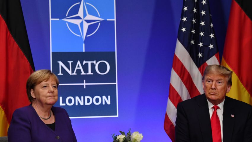 German Chancellor Angela Merkel and U.S. President Donald Trump hold a bilateral meeting on the sidelines of the NATO summit at the Grove hotel in Watford, northeast of London on Dec. 4, 2019.