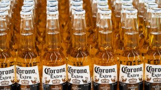 Bottles of Corona beer on a shelf in a store
