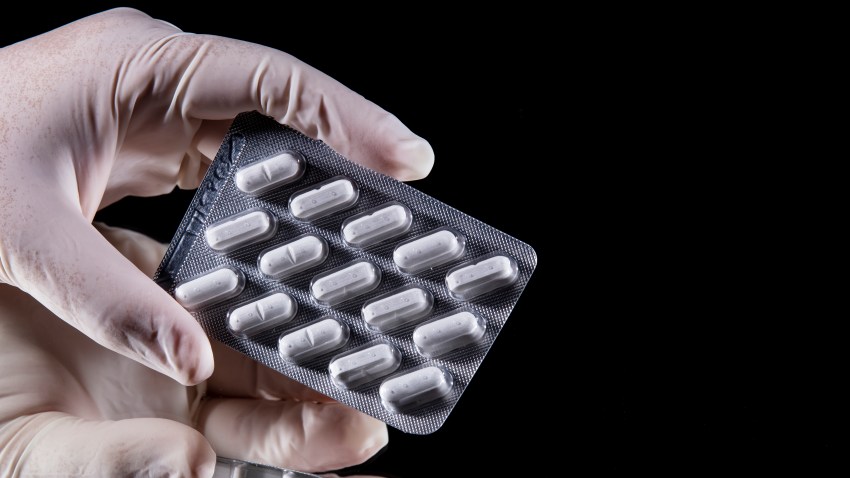 In this photo illustration, tablets on a blister pack of Plaquinol (Hydroxychloroquine) are displayed