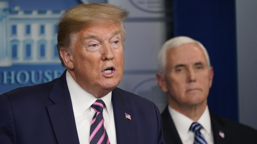 President Donald Trump speaks as Vice President Mike Pence listens during a news conference in the White House in Washington, D.C., on April 24, 2020.