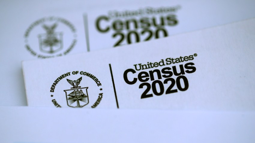 In this file photo, the U.S. Census logo appears on census materials received in the mail with an invitation to fill out census information online on March 19, 2020 in San Anselmo, California.